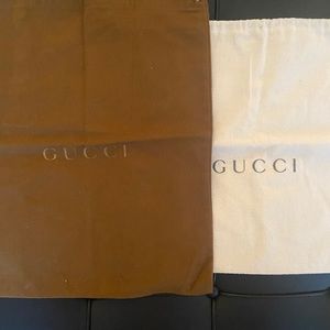 Two Gucci dust bags